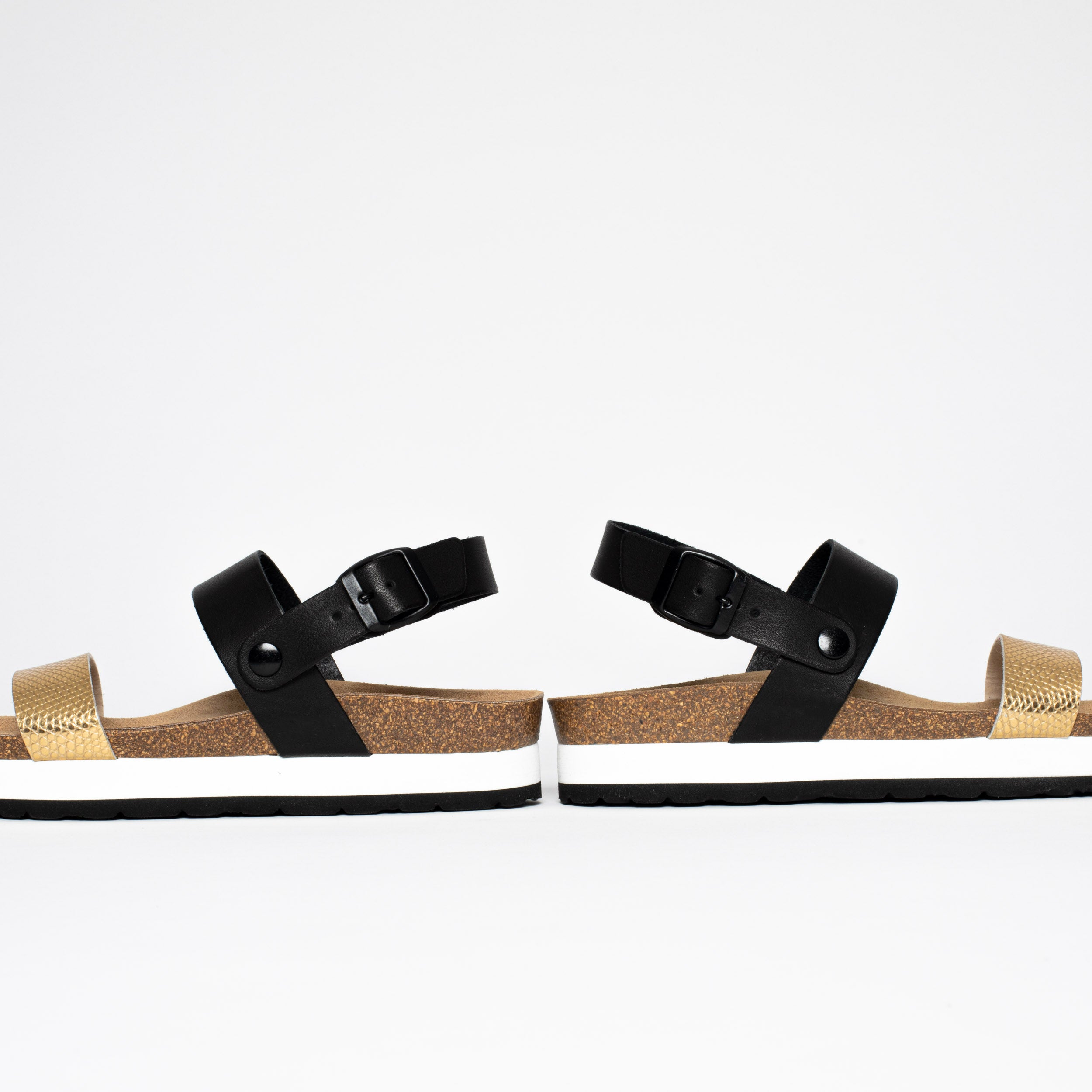 Sandalias con plataforma Gladstone en negro y dorado